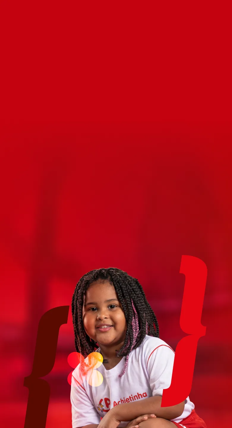 Criança do Colégio Anchieta sorrindo